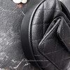 CHANEL 23B Black Caviar Mini Round Clutch