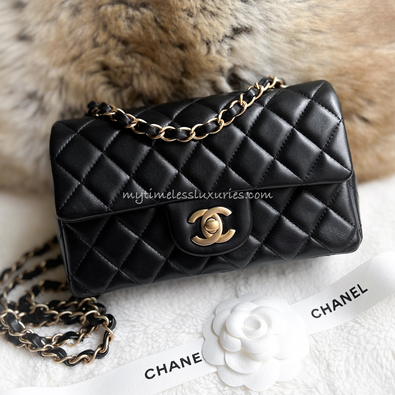 CHANEL Black Lambskin Mini Rectangular Flap Bag - Timeless Luxuries