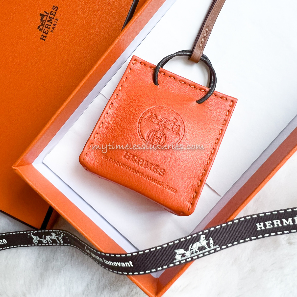 HERMES Orange Shopping Bag Charm Feu/ Gold *New - Timeless Luxuries