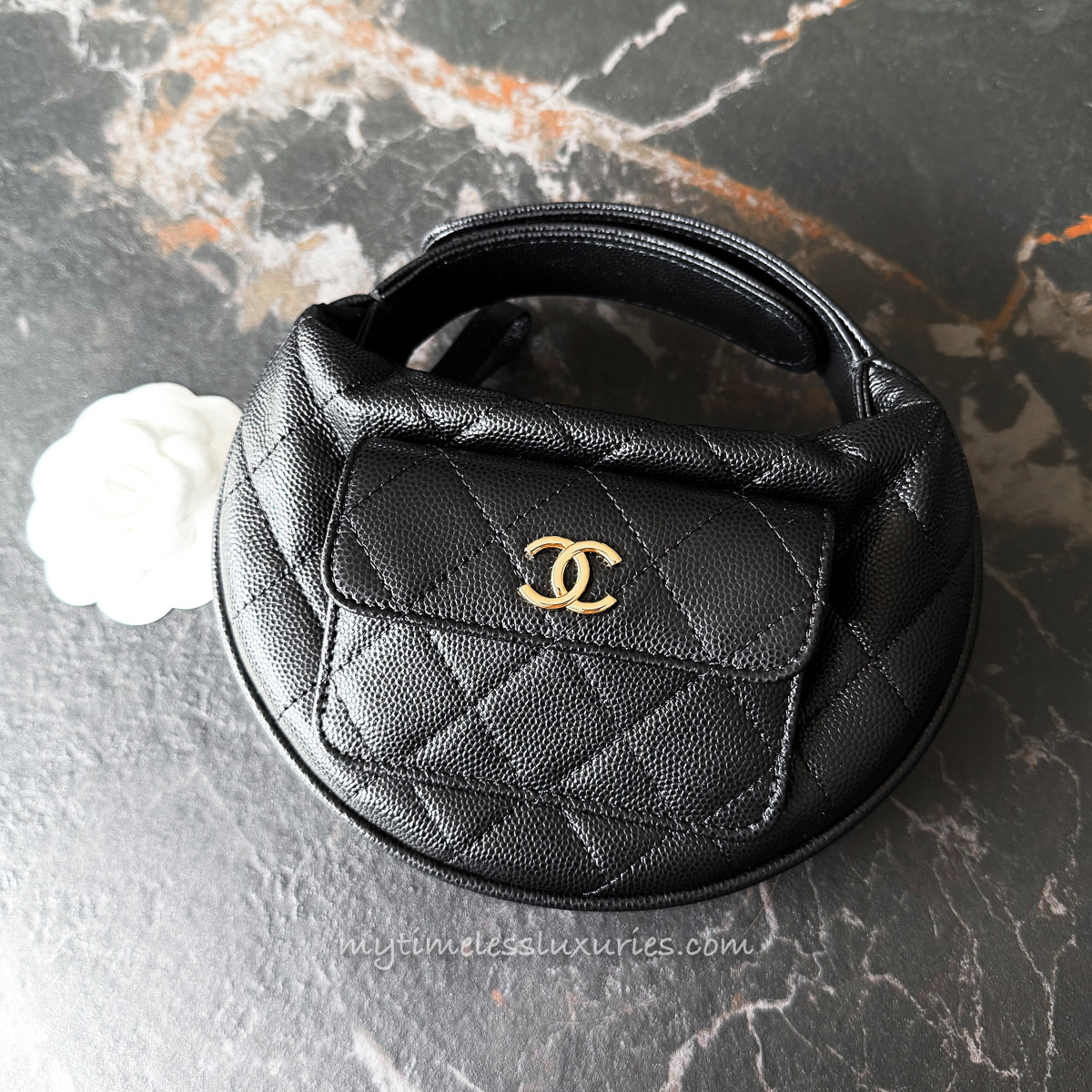CHANEL 23B Black Caviar Mini Round Clutch - Timeless Luxuries