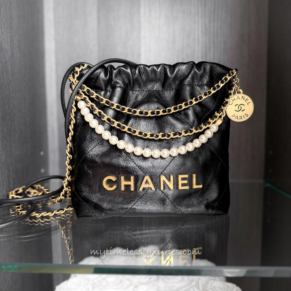 CHANEL 23S Black Calfskin Mini 22 with Pearls - Timeless Luxuries