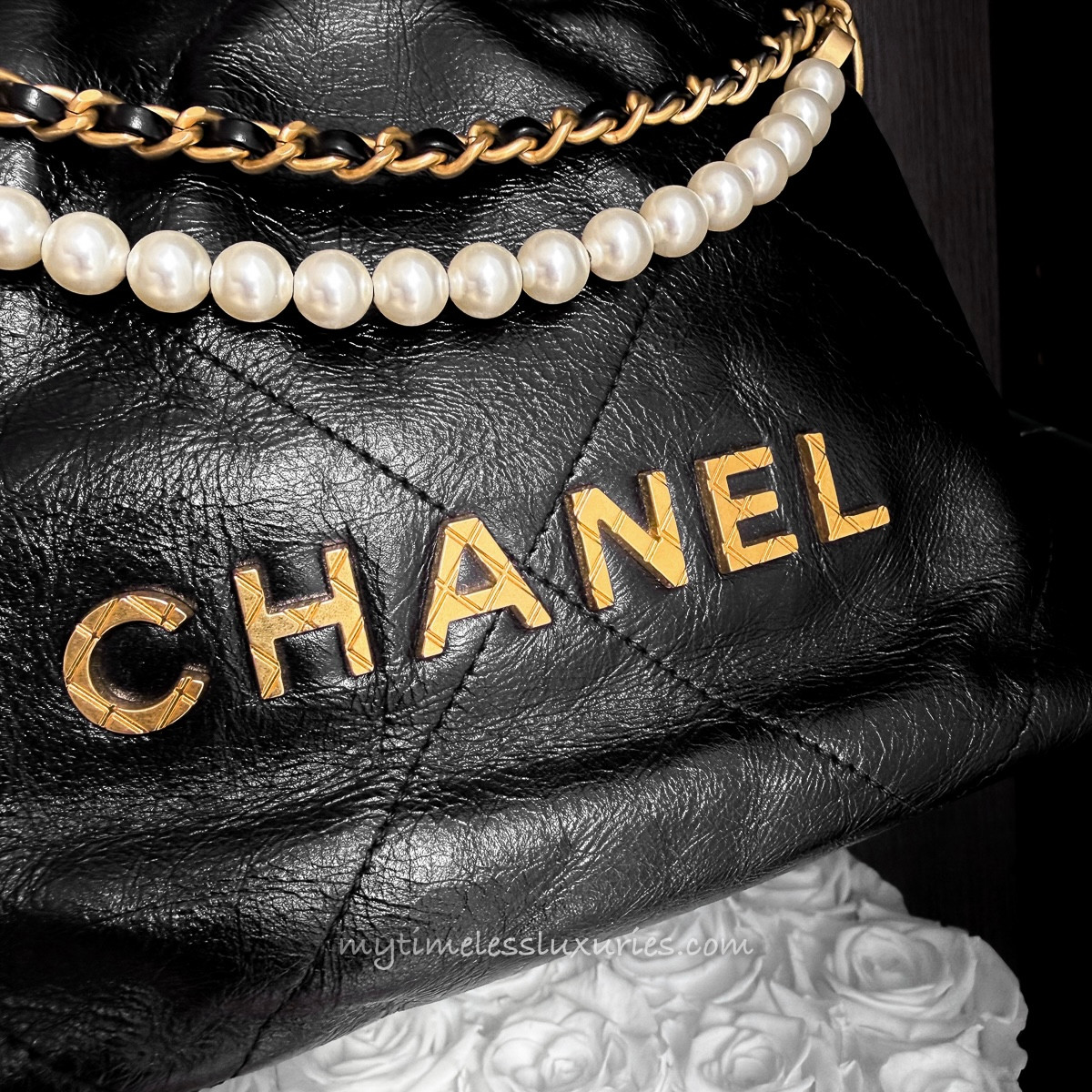 CHANEL 23S Black Calfskin Mini 22 with Pearls - Timeless Luxuries
