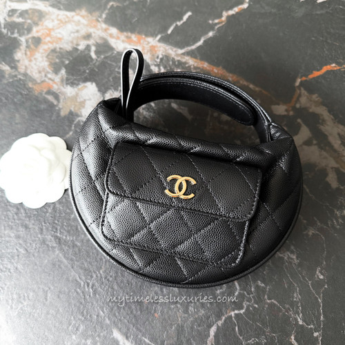 CHANEL 23B Black Caviar Mini Round Clutch