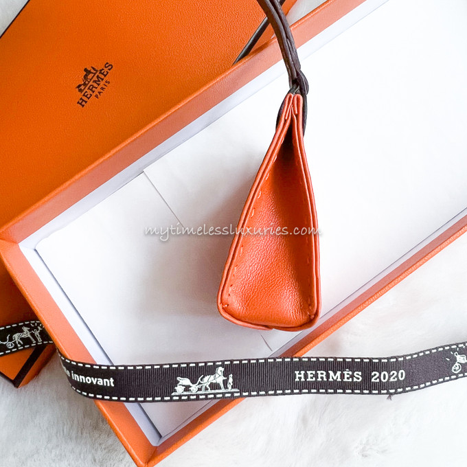 Hermes Orange Shopping Bag Charm For Sale at 1stDibs