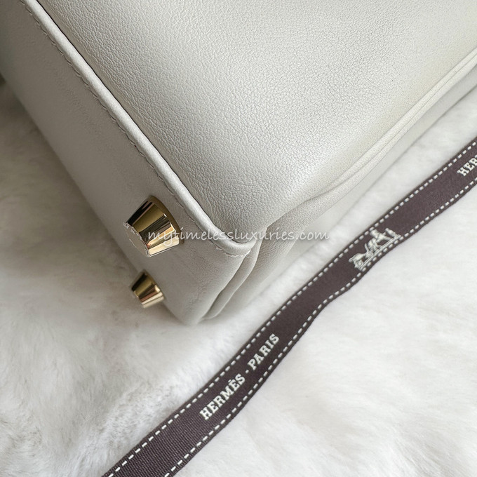 HERMES Kelly 25 Gris Perle Veau Swift Gold Hw - Timeless Luxuries