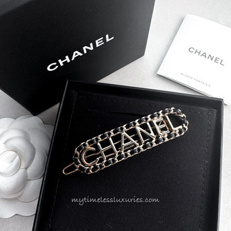 Black Quilted Logo Hair Clip TELETIES: QUILTED MEDIUM FLAT ROUND CLIP- JET BLACK – The  main image 2