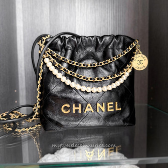 CHANEL 23S Black Calfskin Mini 22 with Pearls - Timeless Luxuries