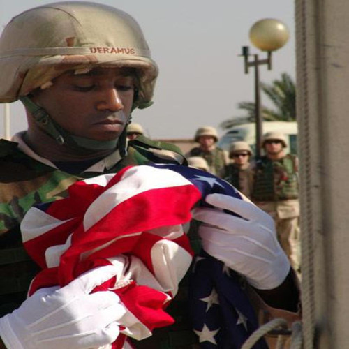 soldiers saluting the flag