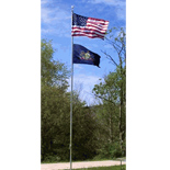 Two flags, flying outdoors on single flagpole