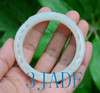 carved white jade bangle