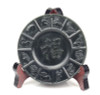 Nephrite jade zodiac plate with “Fu” character on stand, studio lighting