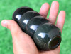 Bottom view of nephrite jade yuanbao cups in natural light