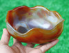 Carnelian agate bowl in natural light, front view