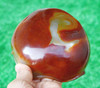 Bottom view of carnelian agate bowl in natural light