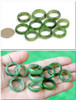 10-piece natural jade rings set SKU F012055A with minor natural blemishes held in hand