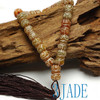 Serpentine prayer beads