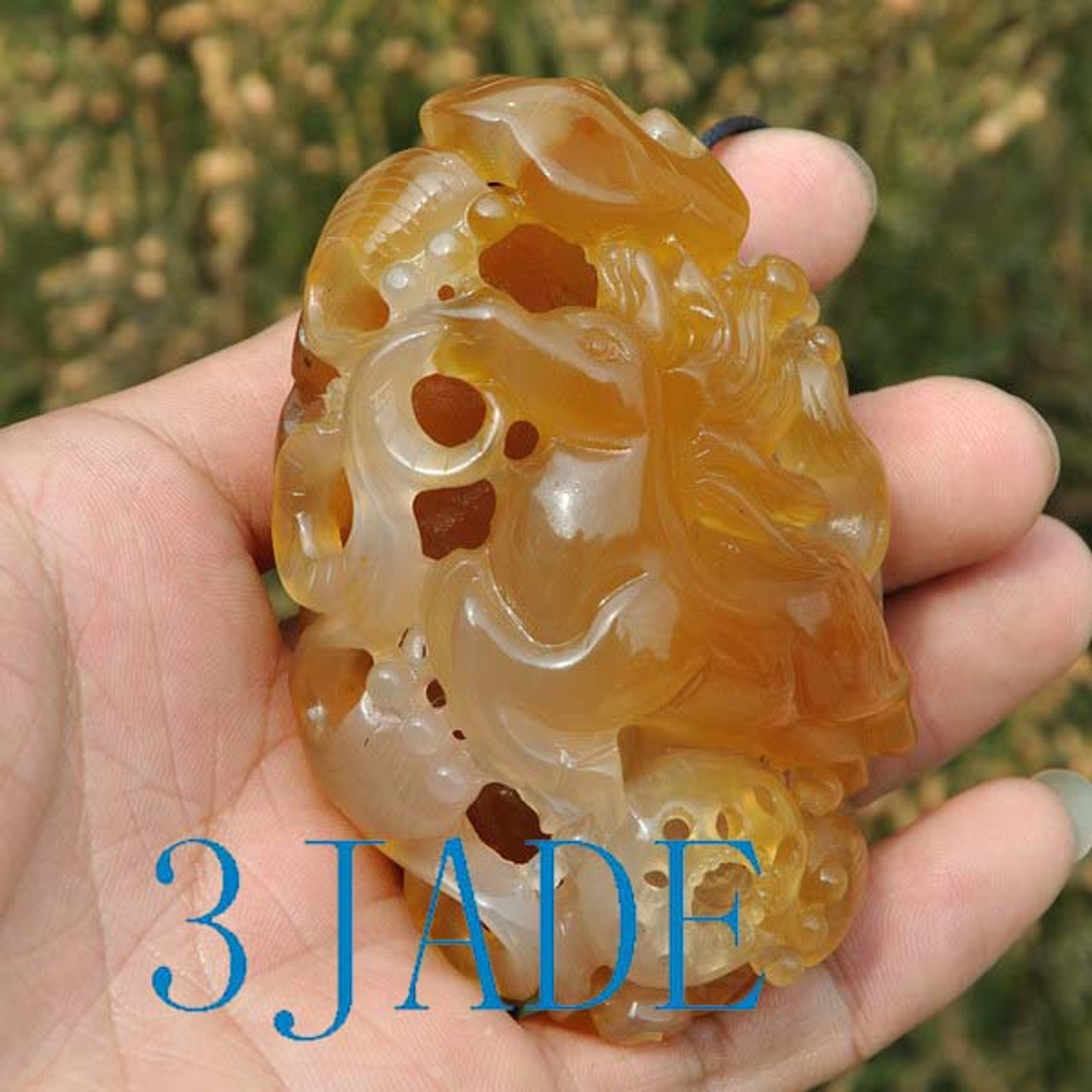 Carved agate paper weight
