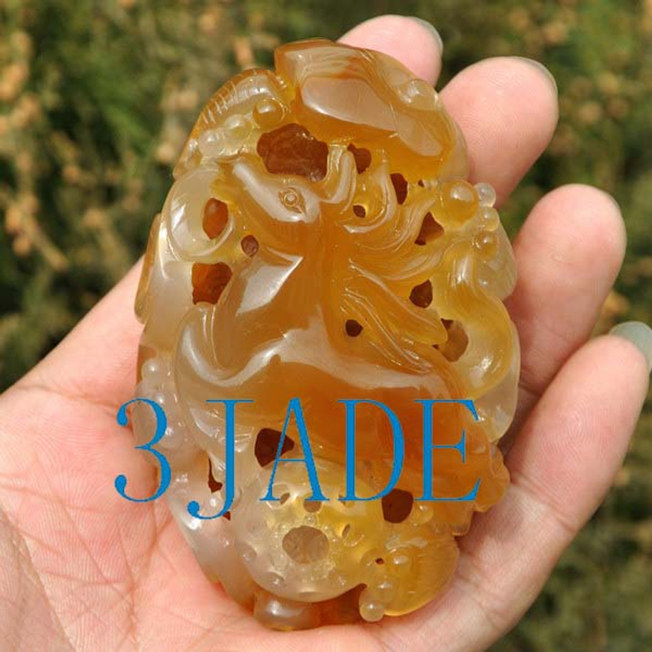 Carved chalcedony paper weight