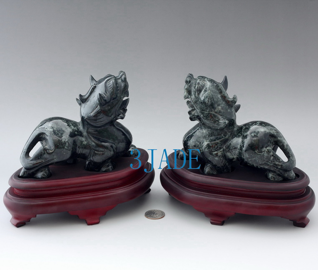 Dushan Jade Pixiu statue pair – divine animal carving angled view