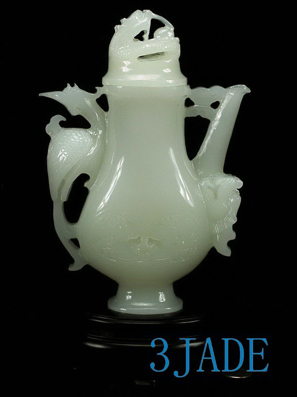Reverse side of the vase under artificial lighting, displayed with its wooden base.