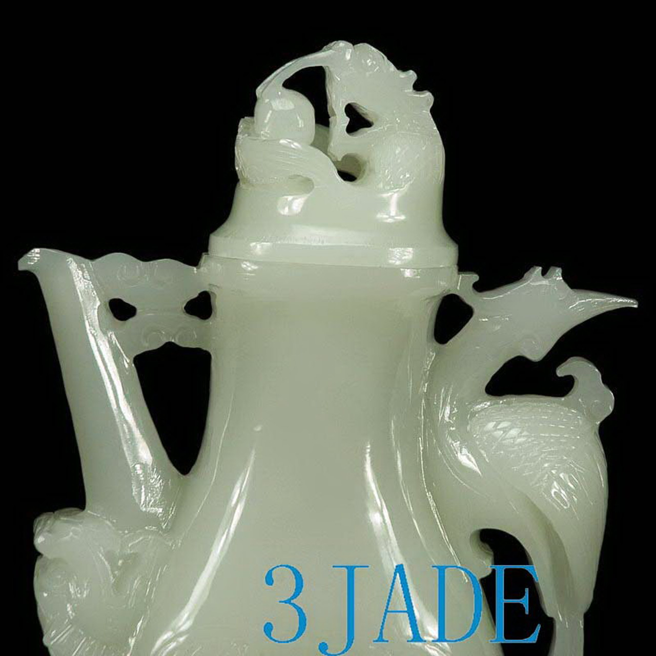 Close-up of the top, showcasing the intricately carved dragon on the lid.