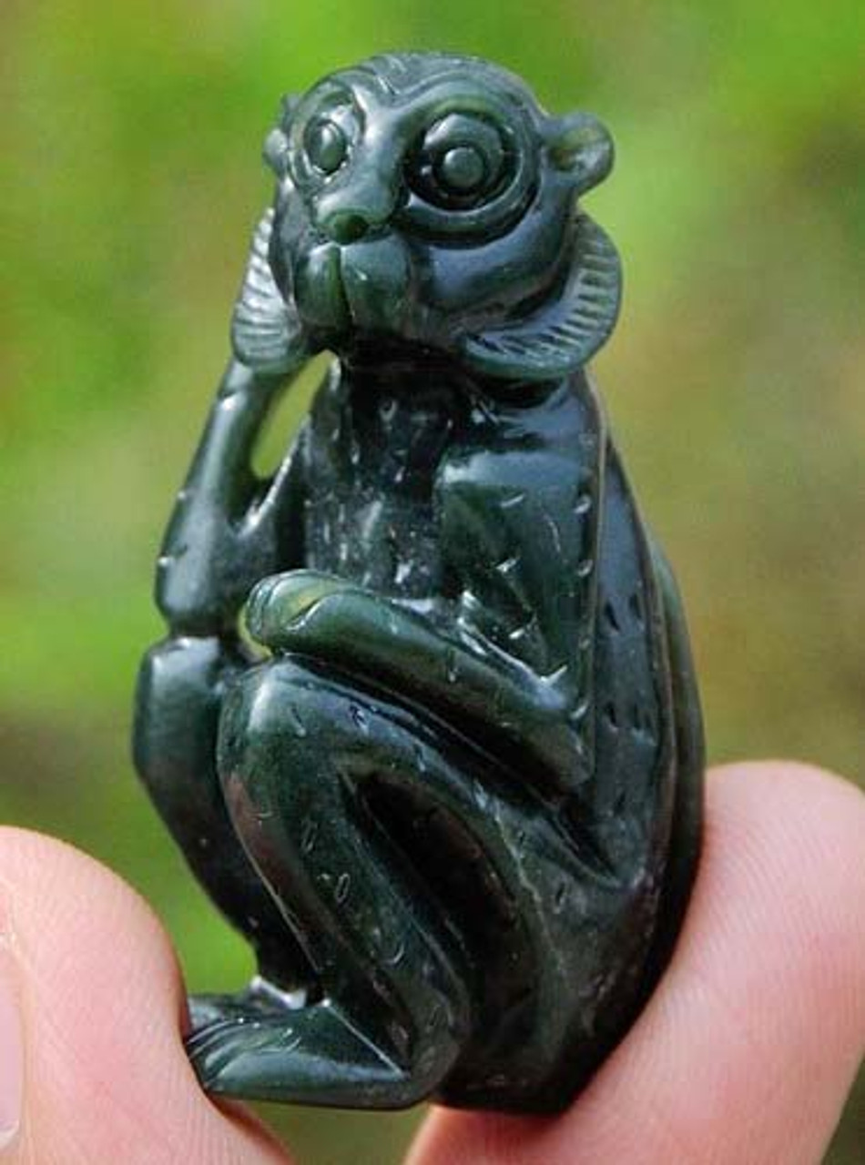 green jade money figurine