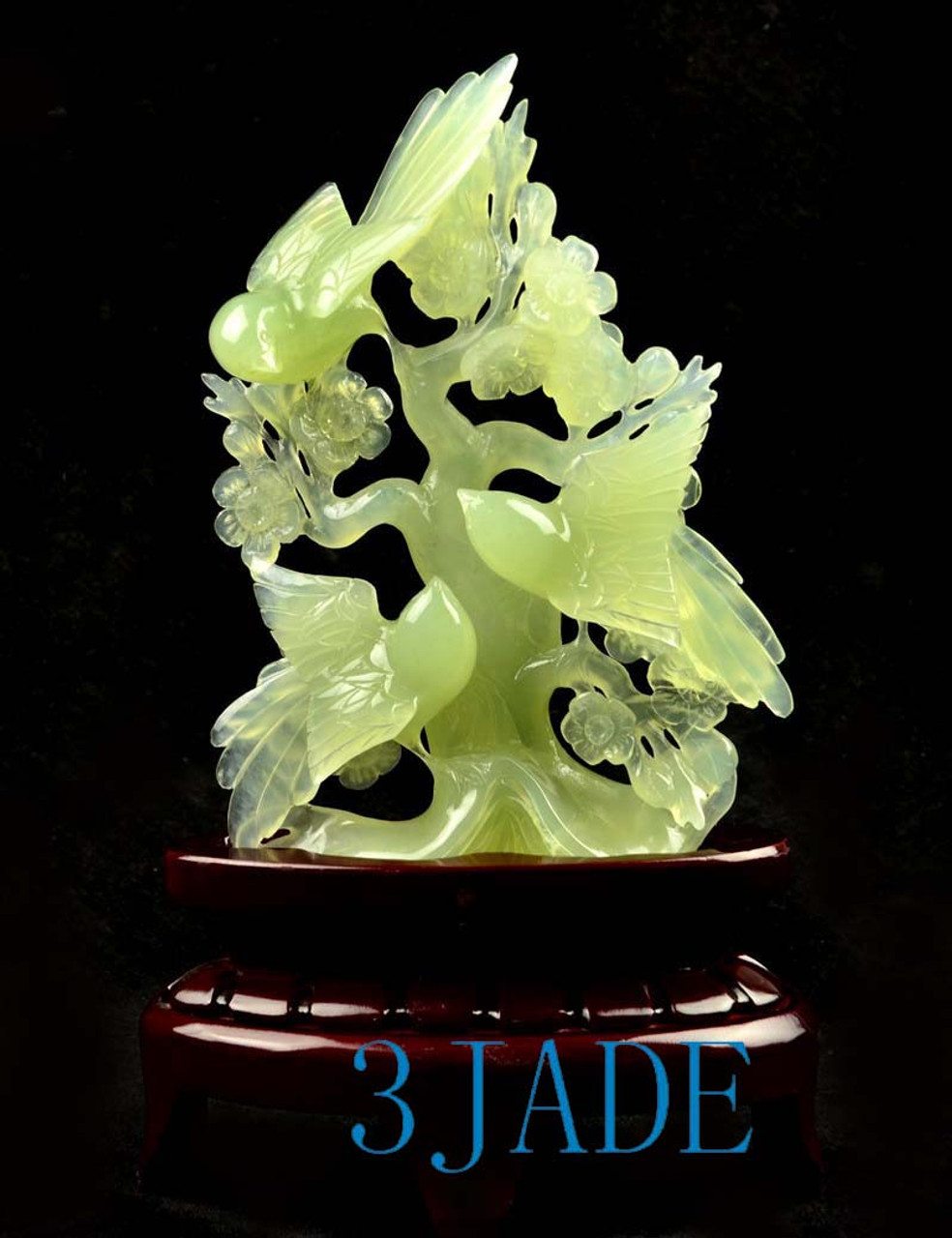 Chinese Xiu jade bird flower carving