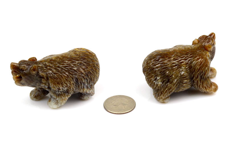 Brown nephrite jade bear carving with natural color variation, studio lighting