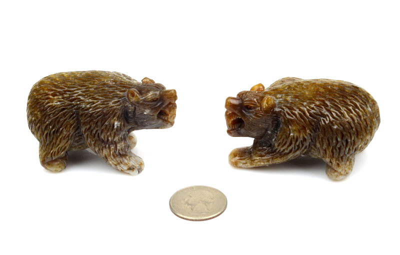 Side view of hand-carved brown nephrite jade bear sculpture showing detailed fur texture