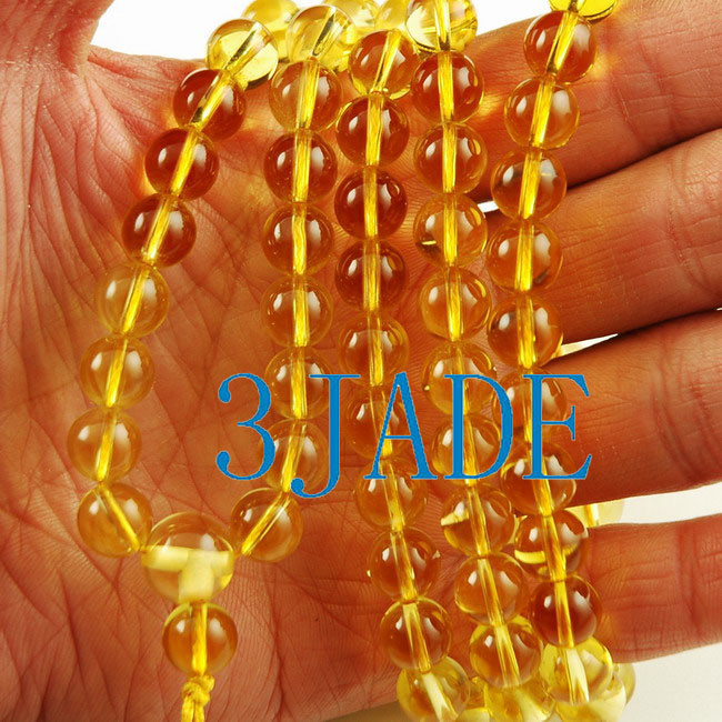 yellow prayer beads