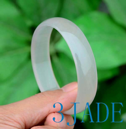 Natural light gray and pale pink agate bangles, glossy finish, shown in a set under lighting.