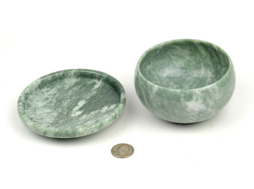 Collection of five natural stone Han-style bowls with lids.
