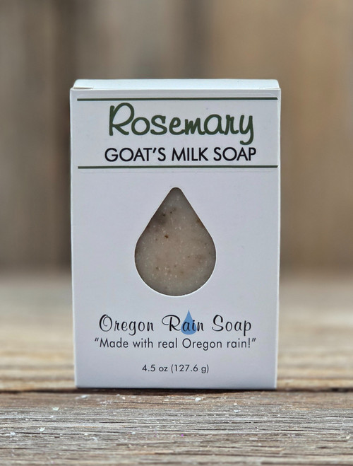 White boxed Rosemary Goat's milk soap with a cutout raindrop to view and smell the soap. Made with real Oregon rain and with rosemary essential oil.