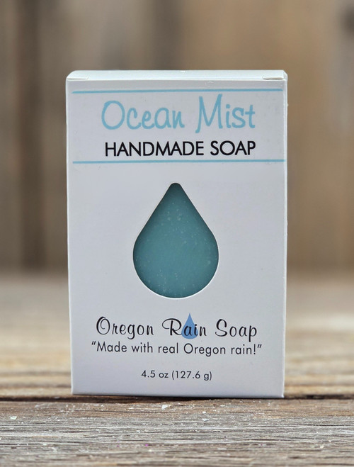 Boxed Ocean Mist Handmade Soap featuring an open raindrop to view the color of the soap and to smell the wonderful serene scent of the Ocean.