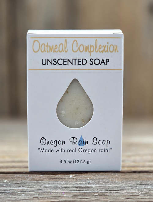 Boxed Oatmeal Complexion Unscented soap 4.5 oz full bar with a cutout raindrop for a view of the soap and a sample smell.