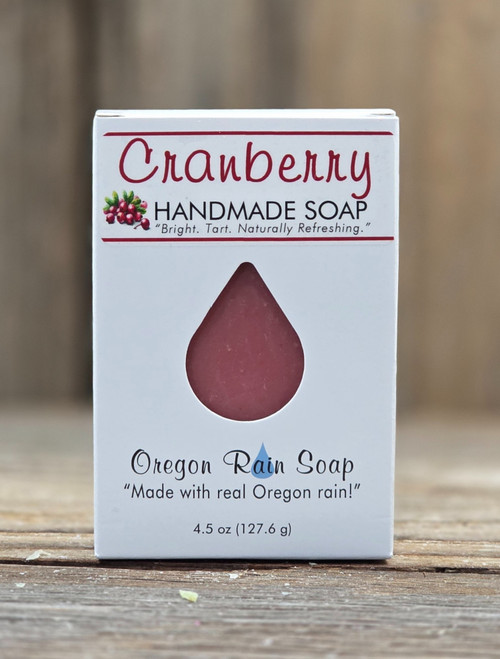 Boxed Cranberry Handmade 4.5 oz Bar Soap with a raindrop cutout to view this pretty colored soap and smell this tart, cranberry scent.