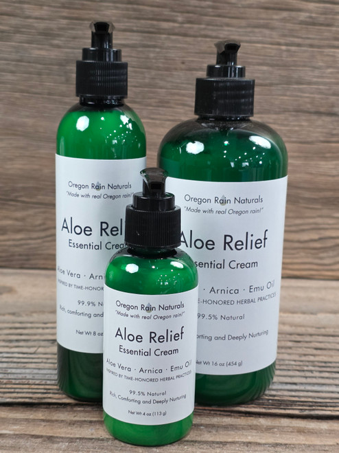 Oregon Rain Naturals Aloe Relief Essential Cream in 4 oz, 8 oz and 16 oz green bottles.