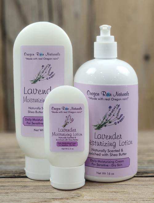 Lavender Moisturizing Lotion in three sizes—2.5 oz, 8 oz, and 16 oz bottles displayed on a wooden background.
