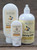 Lemon Orange Blossom Moisturizing Lotion in three sizes—2.5 oz, 8 oz, and 16 oz bottles displayed on a wooden background.