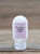 Small 2.5 oz bottle of Oregon Rain Naturals Blackberry Vanilla Moisturizing Lotion with a light purple label on a wooden surface.
