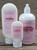 Set of three Oregon Rain Naturals Cranberry Moisturizing Lotion bottles—2.5 oz, 8 oz, and 16 oz—arranged together on a wooden surface.