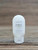 Small 2.5 oz bottle of Oregon Rain Naturals Gardenia Moisturizing Lotion with a white label on a wooden surface.