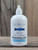 16 oz pump bottle of Pure & Natural Unscented Moisturizing Lotion enriched with nourishing plant oils, displayed on a wooden surface.