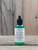 4 oz bottle of Oregon Rain Naturals Aloe Relief Essential Cream with green label and black pump.
