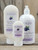 Blackberry Vanilla Moisturizing Lotion in three sizes—2.5 oz, 8 oz, and 16 oz bottles displayed on a wooden background.