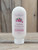 8 oz bottle of Cranberry Moisturizing Lotion with berry graphics on the label, shown on a wooden background.