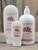 Cranberry Moisturizing Lotion in three sizes—2.5 oz, 8 oz, and 16 oz bottles displayed on a wooden background.