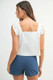 MABLE Poplin Ruffle Strap Front Self Tie Top