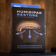 ​Why You Should Humidify Your Acoustic Guitar This Winter (And How to Do It Right)