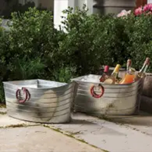 The 18" Colored Jute Handle Boat Tubs are the perfect addition to your home or outdoor entertaining space. These versatile tubs are designed to hold beverages and come in a variety of vibrant colors to match any decor. Made from durable galvanized metal, they are built to withstand the elements and can be used both indoors and outdoors. The jute handles add a touch of rustic charm and make it easy to transport the tubs from one location to another. Whether you're hosting a backyard barbecue or a pool party, these boat tubs are sure to impress your guests and keep their drinks cool and refreshing.